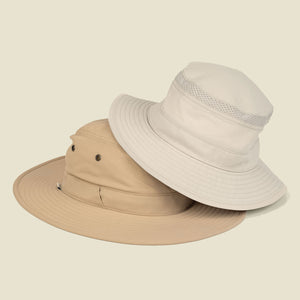 A studio photo of two Sunday Afternoons Bucket Hats stacked on top of each other.