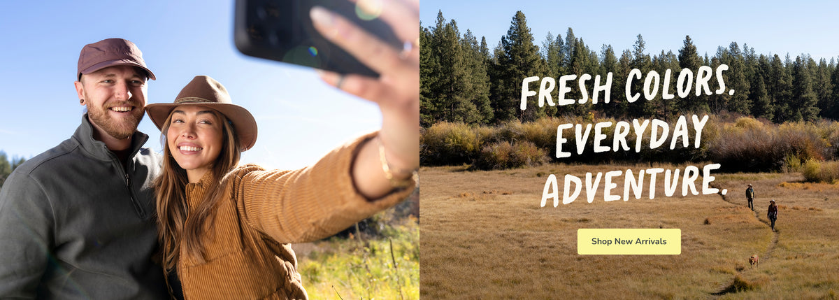 A split promotional banner: on the left, a smiling couple takes a selfie outdoors in bright blue sky; on the right, a scenic meadow with pine trees and large text reading 'FRESH COLORS. EVERYDAY ADVENTURE.